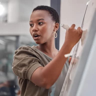 woman with a white board